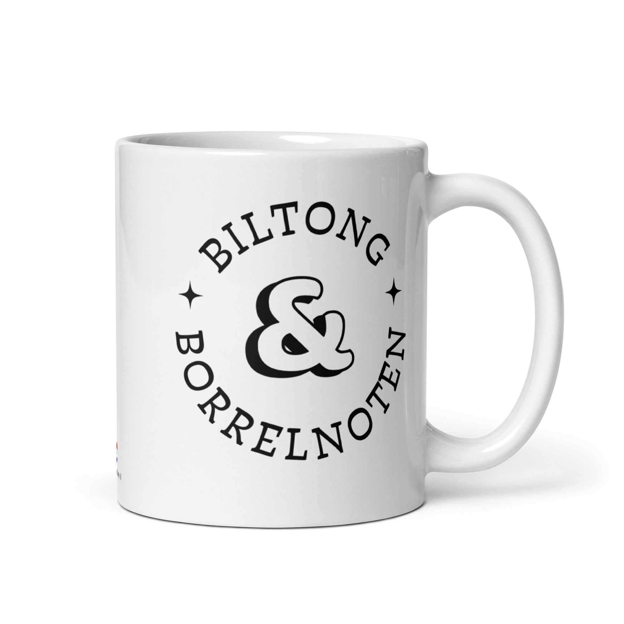 White glossy ceramic mug with black typographic design reading “Biltong & Borrelnoten,” funny South African and Dutch crossover mug.