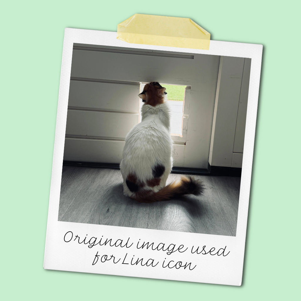 olaroid-style photo of calico cat Lina Love sitting with her back to the camera, looking out through a square opening in a white door onto green grass, on a mint green background with handwritten caption ‘Original image used for Lina icon.’