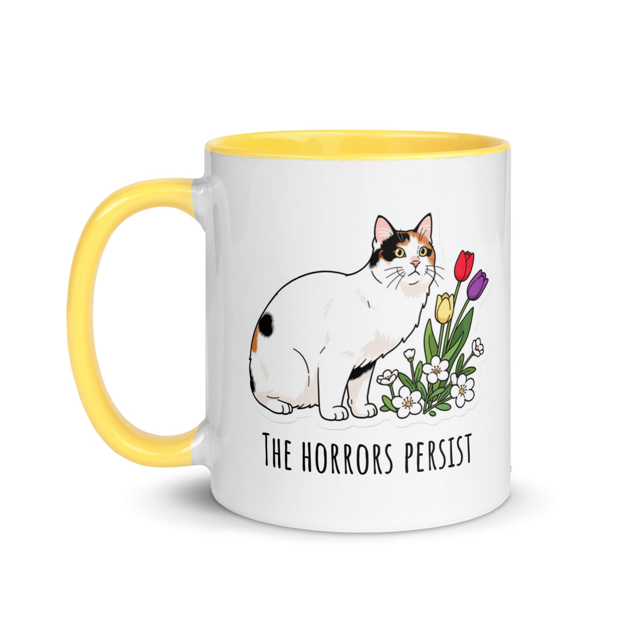 White ceramic mug with yellow rim and handle featuring calico cat Lina Love standing beside flowers and the text “The horrors persist, but so do the snacks.”