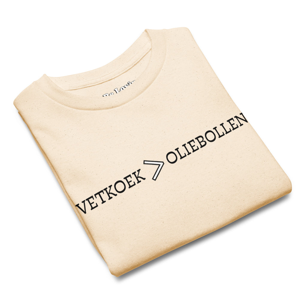 Natural kids t-shirt with the text “Vetkoek > Oliebollen” printed across the chest, South African Roots youth tee.