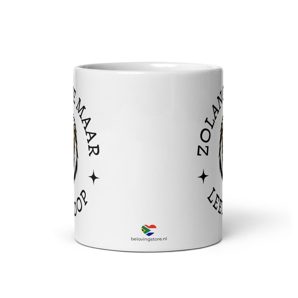 White glossy ceramic mug with lion illustration and the phrase “Zolang je maar leeuloop,” South African Roots mug inspired by the Afrikaans song “Leeuloop.”