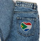 Heart-shaped embroidered patch combining South African and Dutch flag colours, Two Homes One Heart South African Roots accessory.