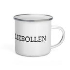 White enamel camping mug with silver rim and wraparound black “Vetkoek > Oliebollen” text, part of the South African Roots collection.