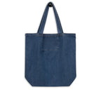 Dark blue organic denim tote bag with small embroidered Two Homes One Heart design combining South African and Dutch flag colours.