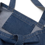 Dark blue organic denim tote bag with small embroidered Two Homes One Heart design combining South African and Dutch flag colours.
