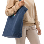 Dark blue organic denim tote bag with small embroidered Two Homes One Heart design combining South African and Dutch flag colours.