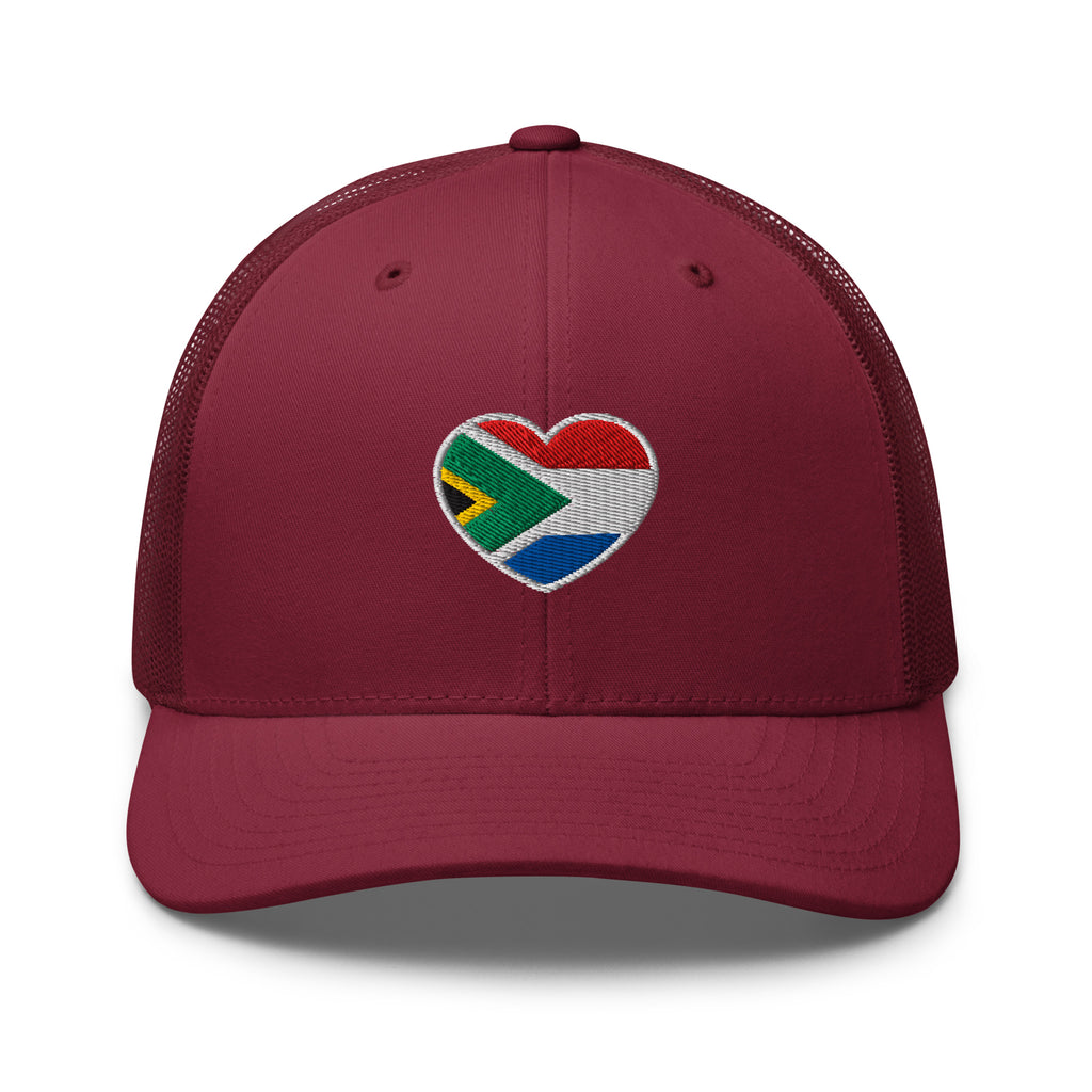 Cranberry mesh-back trucker cap with embroidered Two Homes One Heart design combining the South African and Dutch flags.