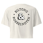 Women’s crop top with a small Two Homes One Heart design combining South African and Dutch flags on the chest and large Biltong & Borrelnoten graphic on the back.