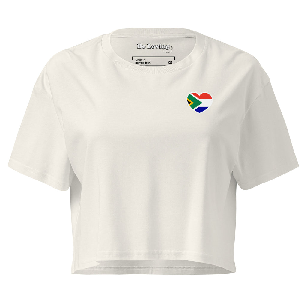 Women’s crop top with a small Two Homes One Heart design combining South African and Dutch flags on the chest and large Biltong & Borrelnoten graphic on the back.