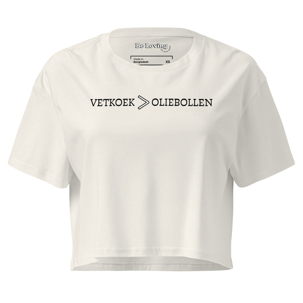 Women’s cropped t-shirt with “Vetkoek > Oliebollen” printed in black across the chest, South African Roots collection top.