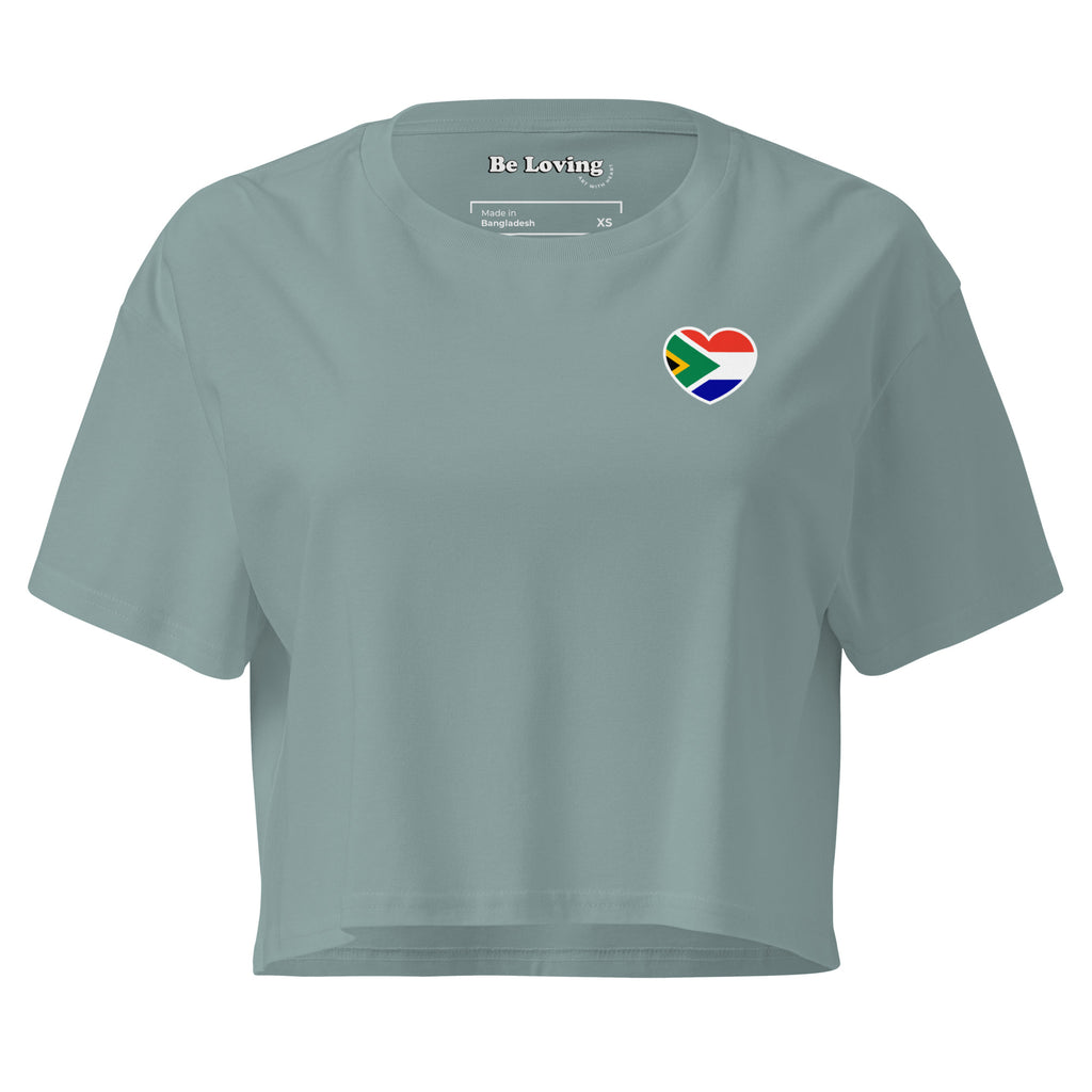 Women’s crop top with a small Two Homes One Heart design combining South African and Dutch flags on the chest and large Biltong & Borrelnoten graphic on the back.