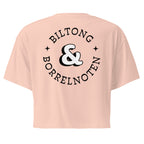 Women’s crop top with a small Two Homes One Heart design combining South African and Dutch flags on the chest and large Biltong & Borrelnoten graphic on the back.