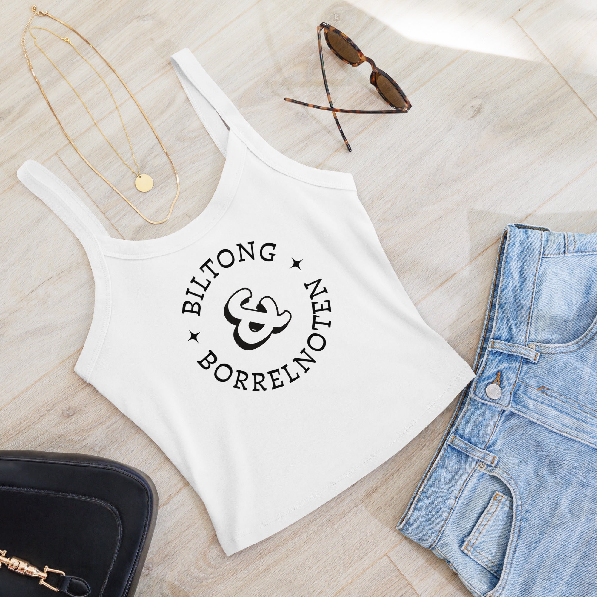 Women’s micro-rib tank top with large black “Biltong & Borrelnoten” circular graphic printed on the front.